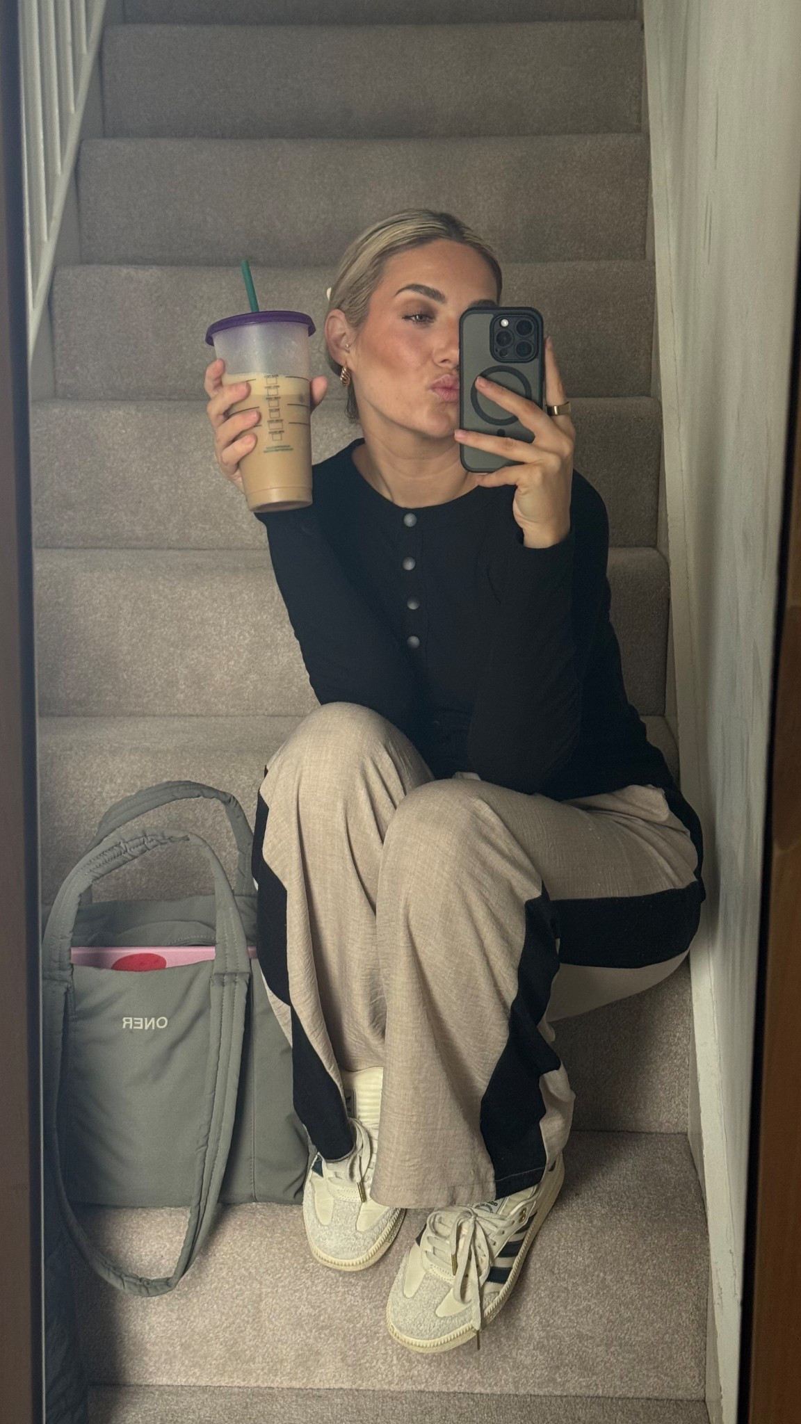 Work casual, an everyday comfortable outfit. Long sleeve black button up top, wide leg tailored trousers with black stripe and a functional bag with all the compartments you need.

Trousers from last year now sold out.

#LTKworkwear #LTKeurope #LTKuk