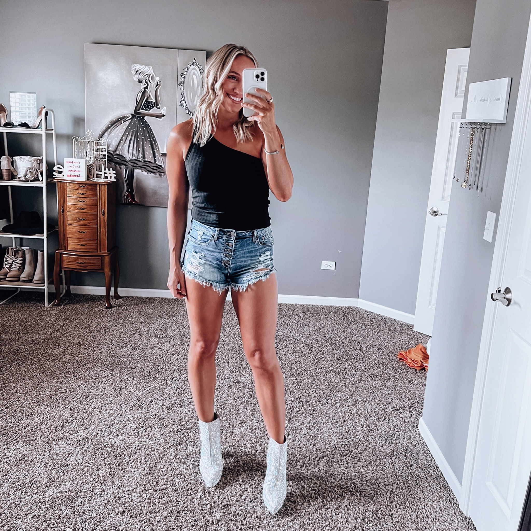 Morgan Wallen concert outfit. Summer outfit ideas. Country concert outfit. Rhinestone boots. Denim shorts. Jean shorts. Distressed shorts. Raw hem shorts. One shoulder tank top. Betsey Johnson boots  


#LTKshoecrush #LTKstyletip #LTKfindsunder50