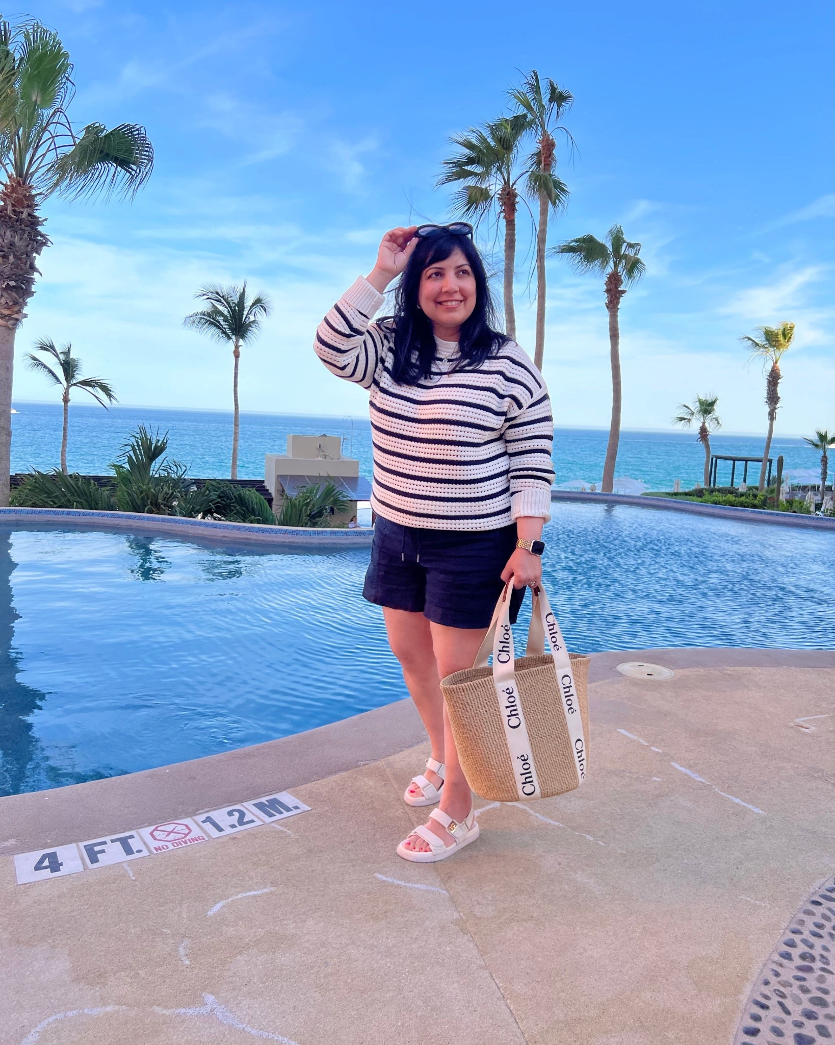 Athleta linen shorts on sale 40% off! 

Spring and summer outfits 2026! Vacation outfit that’s perfect for cool evenings! Perfect for your next beach vacation. Athleta linen shorts size large. Lululemon striped cotton crochet sweater size medium. Steve Madden sandals true to size. Chloe straw tote bag. Celine sunglasses.

#LTKSaleAlert #LTKMidsize #LTKOver40