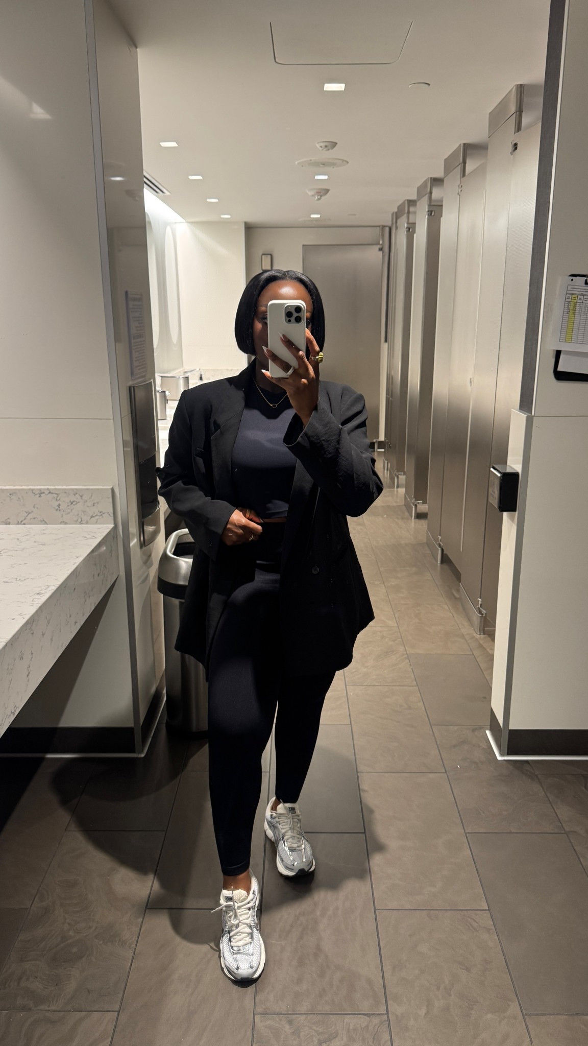 Wearing a large in this oversized blazer from dynamite, a medium in the tights and a medium in the sleeveless cropped top. These Nike sneakers are so comfortable, too. Cute travel outfit!

#LTKTravel #LTKActive #LTKootd