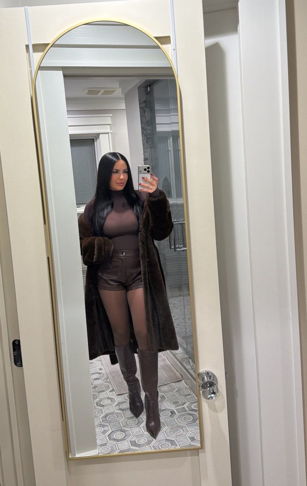 Brown Leather shorts, faux fur brown coat, brown boots, brown bodysuit 

#LTKHoliday #LTKSeasonal