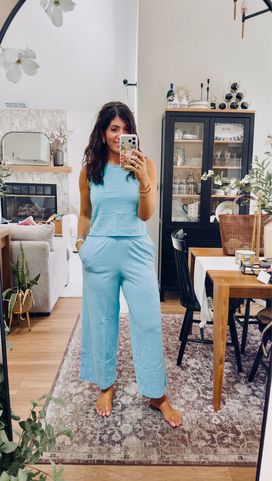 In a medium tank and medium wide leg pants

#LTKMidsize #LTKOver40 #LTKSaleAlert