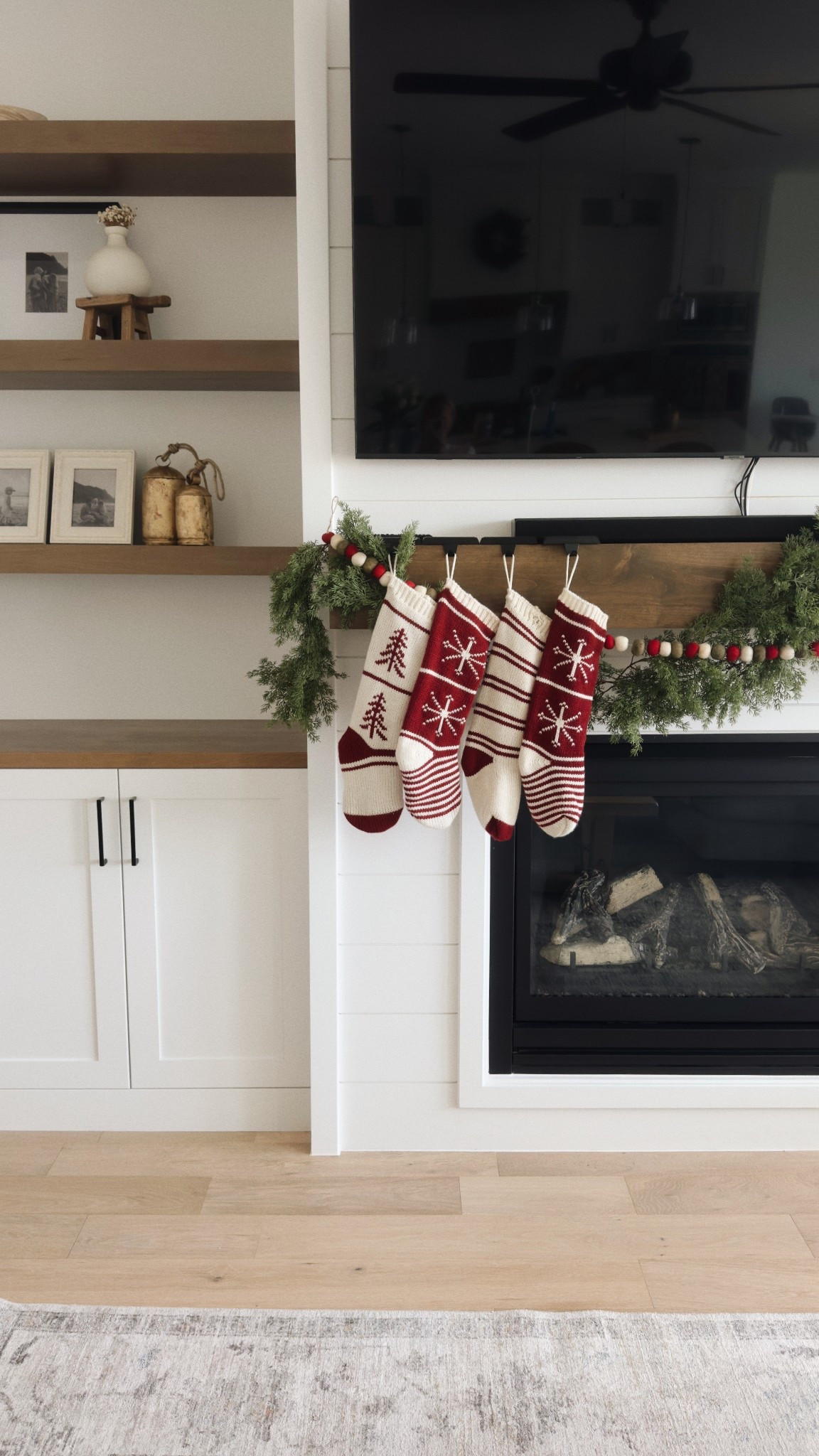 Christmas fireplace mantle decor with stockings & garlands 🎄 

#LTKHoliday #LTKHome #LTKmomlife