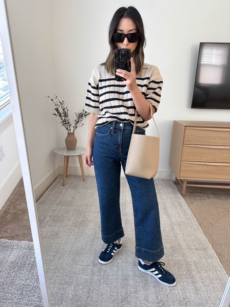 Wyeth stripe polo sweater. Love this piece so much! The lined detail, short sleeve, and collar make it a statement piece. Runs shorter and wider. 

Wyeth sweater xs
J.crew jeans 24 petite
Adidas gazelle sneakers 4.5 men’s. 
The Row tote small
Celine sunglasses 

#LTKshoecrush #LTKitbag #LTKSeasonal