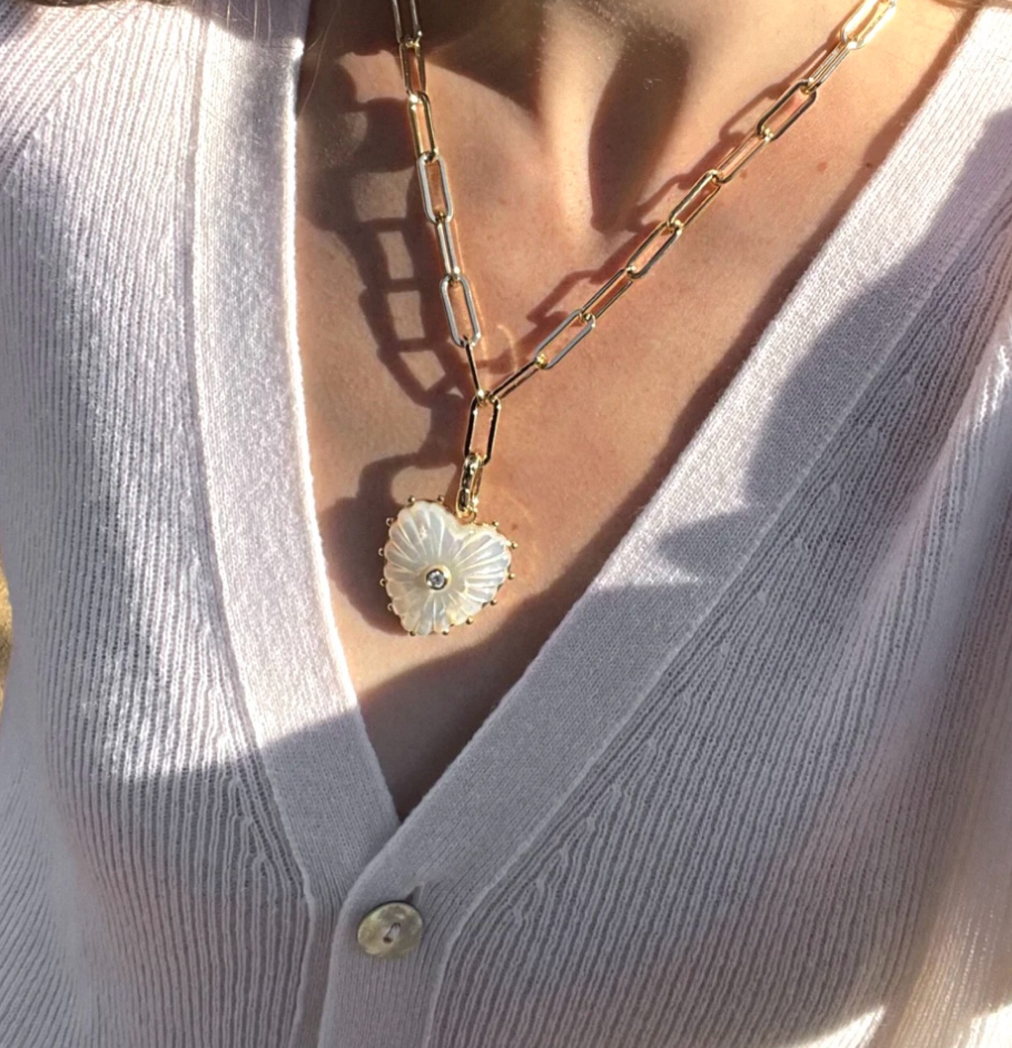 Love the mother of pearl 🤍
A perfect Mother’s Day gift 
Available in several colors 
The paperclip chain is adjustable. 
The stone is hand carved.  
Everything you want and need in a statement necklace 

#LTKMothersDay #LTKOver40 #LTKU