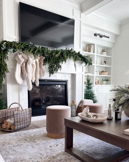 My three favorite garlands for the holiday and winter season are all in stock! This is our mantle from a few years ago, and I have the Norfolk Pine garland, Afloral Faux Cedar garland, and Walmart Seeded garland all styled together here for a full and beautiful look!

#LTKhome #LTKstyletip #LTKHoliday