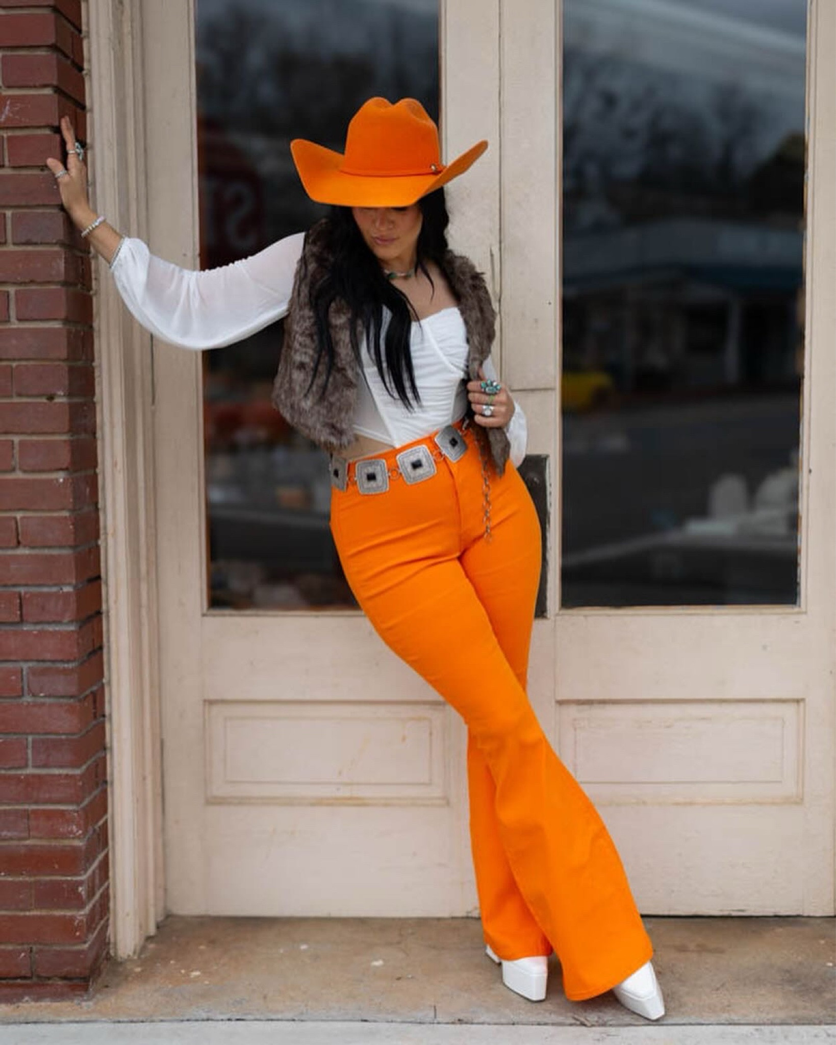Cowgirl outfit. Country concert outfit. Western fashion. Bell bottom outfit. Cowgirl hat. Concho belt. Neon cowgirl. Platform boots 

#LTKmidsize #LTKshoecrush #LTKU
