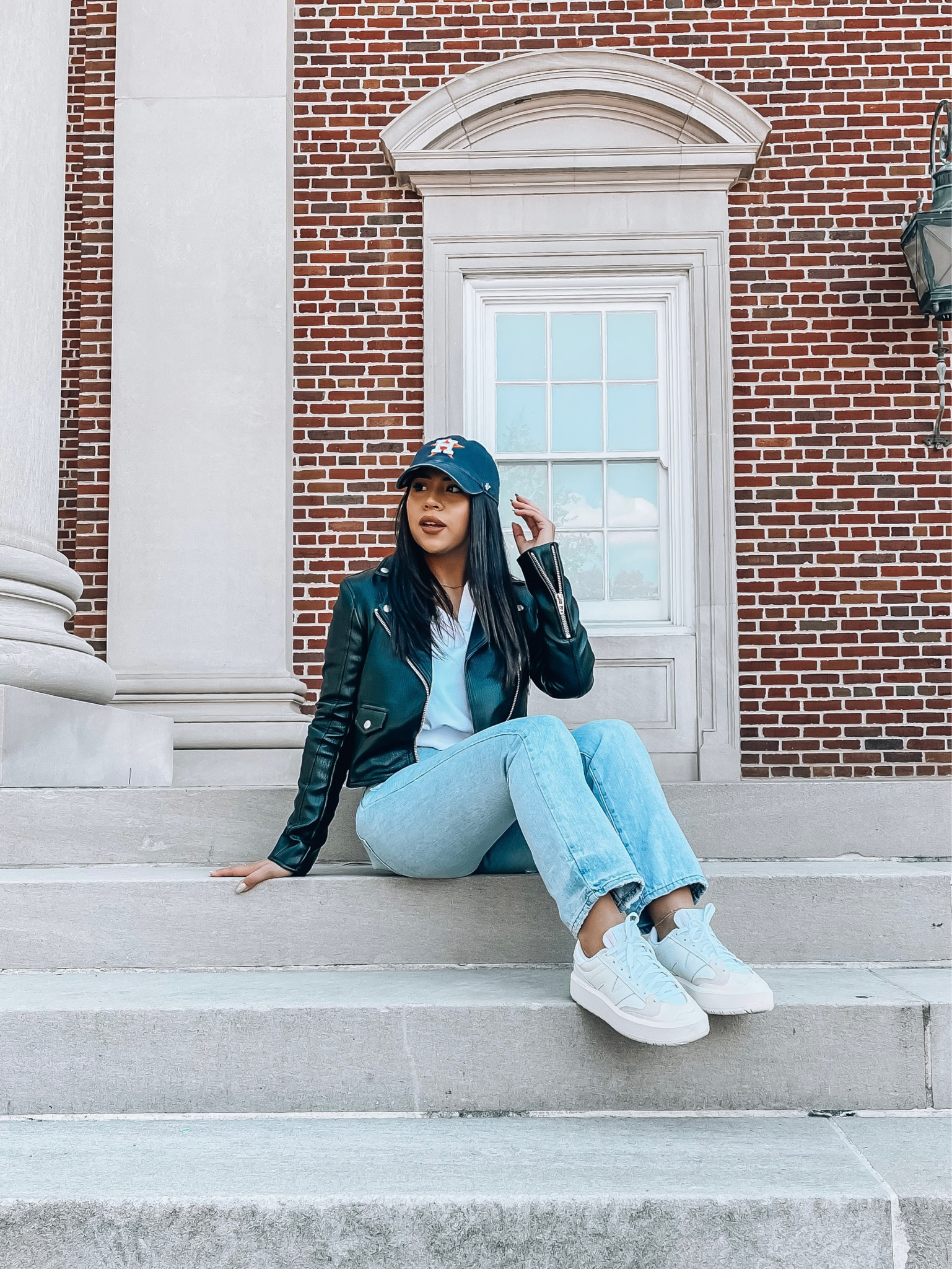 Baseball game outfit idea 
Hoodie: xs 
Faux leather jacket: xs 
Jeans: 25 
New balance sneakers: 4.5 youth 
Baseball cap 

#LTKSeasonal #LTKstyletip #LTKunder100
