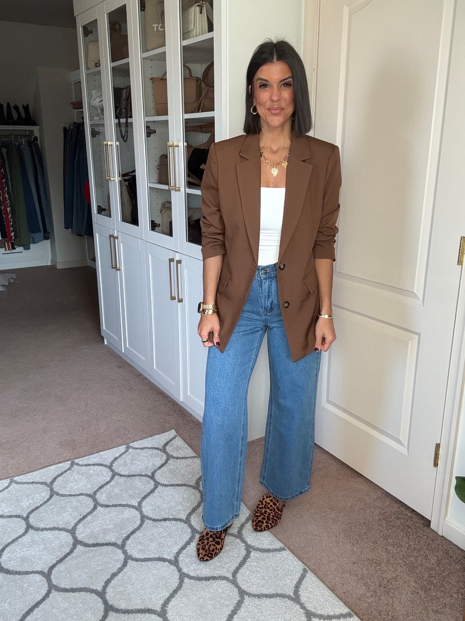 Sized up one to a medium in blazer size small in tank and jeans 

#LTKFindsUnder100 #LTKSeasonal