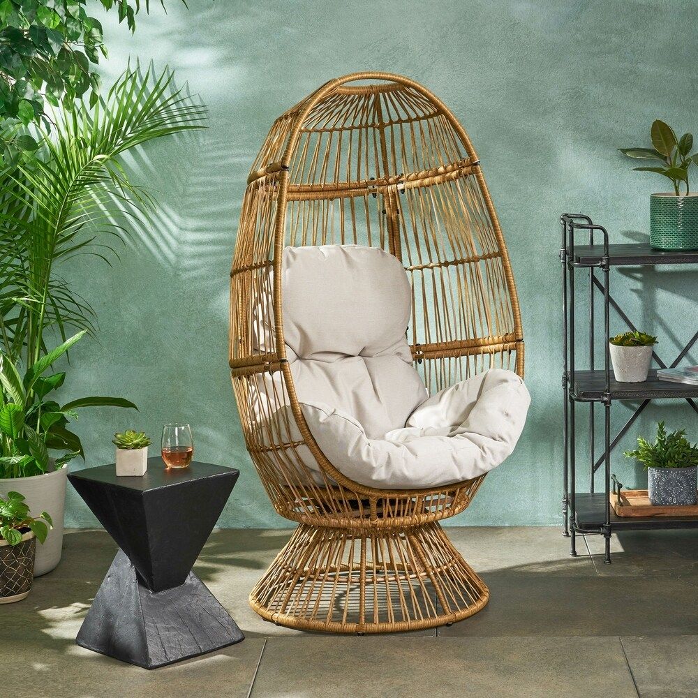 Pintan Outdoor Wicker Swivel Egg Chair with Cushion in Light Brown + Beige Cushion by Christopher Kn | Overstock