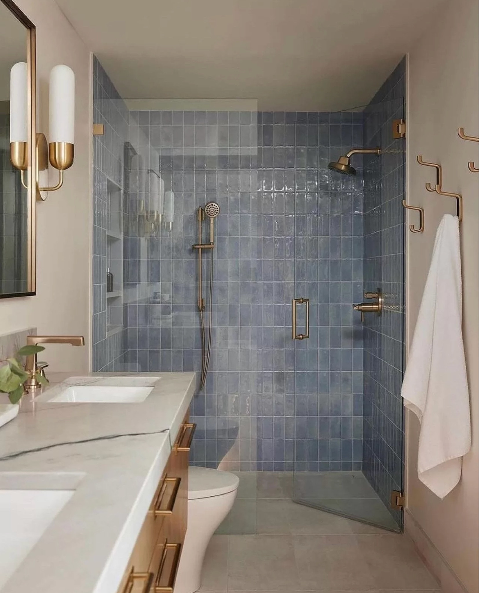 Blue bathroom tile 

#LTKHome