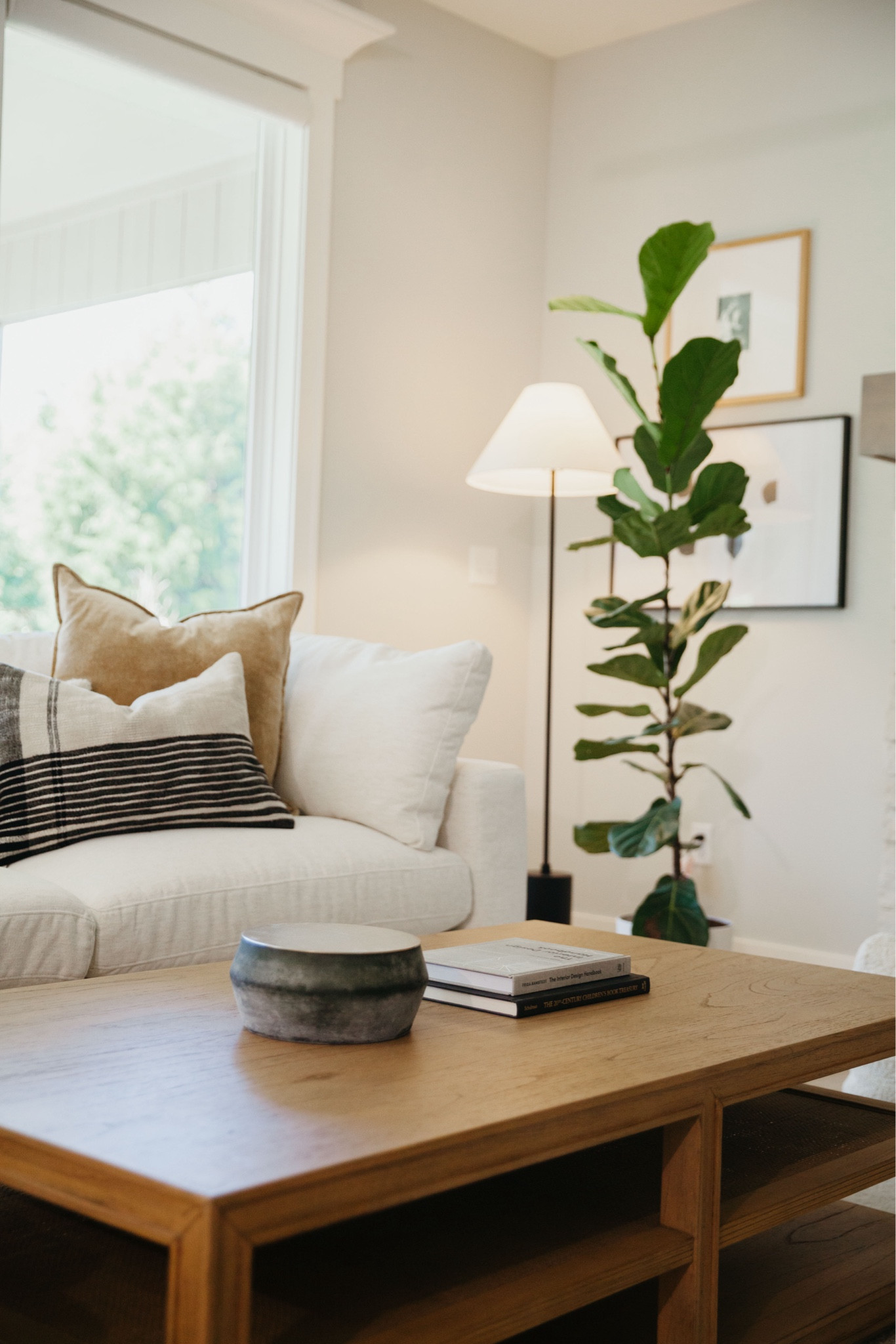 Airy living room design for a calm cool collected, modern, livable luxury feel with a white sofa, leather side, chairs, Empire, shade floor lamp, large, easy, plant tree, and lots of texture. Living room refresh & virtual design 

#LTKSeasonal #LTKHome #LTKStyleTip