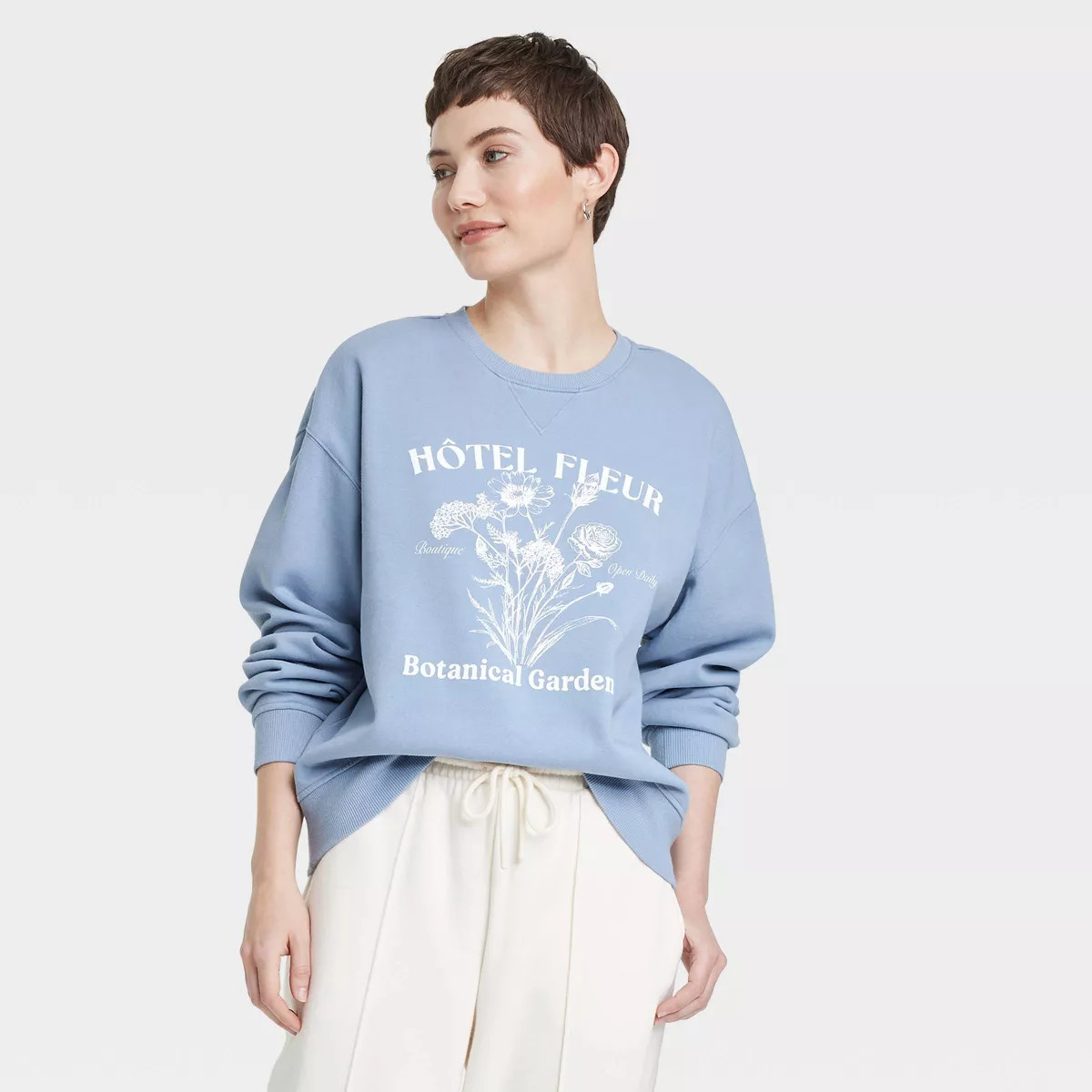 Women's Leisure Studio Oversized Graphic Sweatshirt - Universal Thread™ | Target