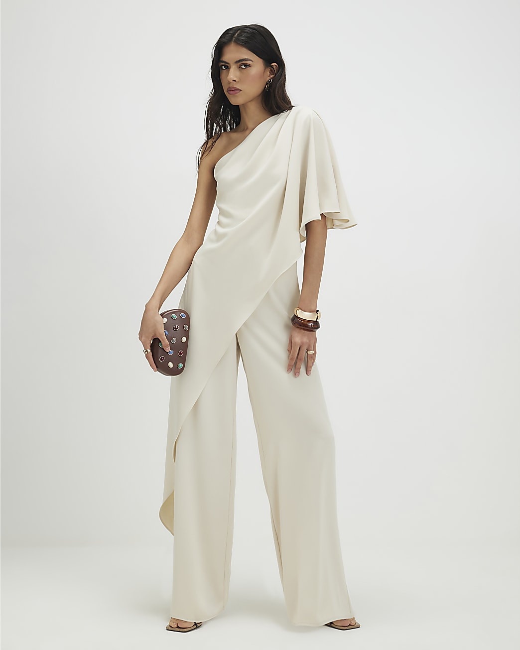 Cream One Shoulder Overlay Jumpsuit | River Island UK & IE