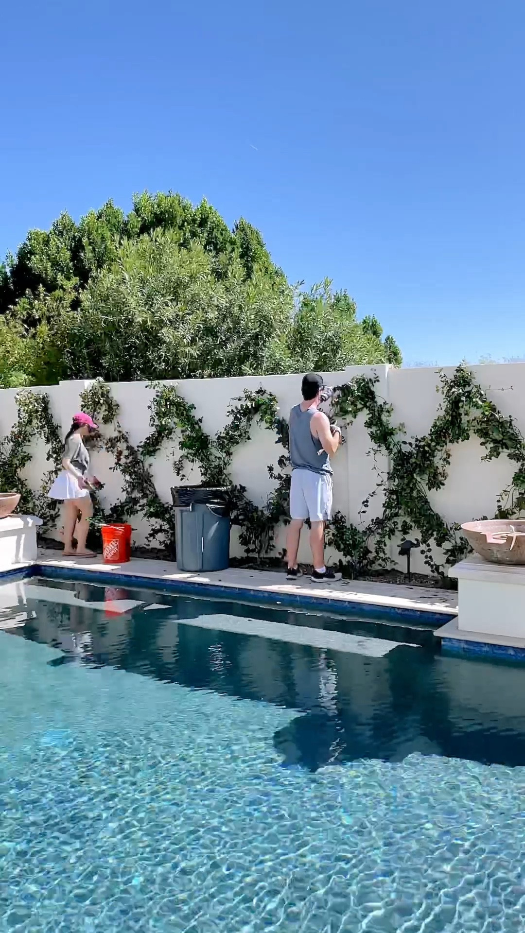 HOW TO INSTALL A DIAMOND TRELLIS

I get asked often how we installed our star Jasmine in a diamond shape so I’m reposting this from last year! Hope it helps and happy gardening! 🪴 FYI - in this video it’s a bit tangled due to having to remove it for paint but within a few weeks, it looks much more lush and green 

1) MEASURE: You’ll need to know how wide & tall your wall is. For reference, ours is 42’ wide and 6’ tall

2) EYE SCREWS: install eye screws at every bottom, top, and cross point of the diamond.
Each bottom point of our diamonds are 3.5’ apart. We have 11 diamonds total.

3) VINE WIRE: get a sturdy vine wire and thread it through the eyescrews. We cut and used about 7.5 length pieces.

PLANT: install a vine about 10” away from your wall and wrap around the vine wire as it grows. You can also use vine twine/wire to attach and secure any longer stands to the trellis. We used Star Jasmine which doesn’t shed much, is perfect for narrow spaces, and for behind our pool.

I have more before, during, and after pictures + detailed information over on my blog.
FiveFootFeminine.com/2020/11/07/diamond-
trellis-wall/

#landscapedesign #gardeningtips #backyardgarden #patiodesign #gardeninspo #trellisgarden #trellis 

#LTKHome