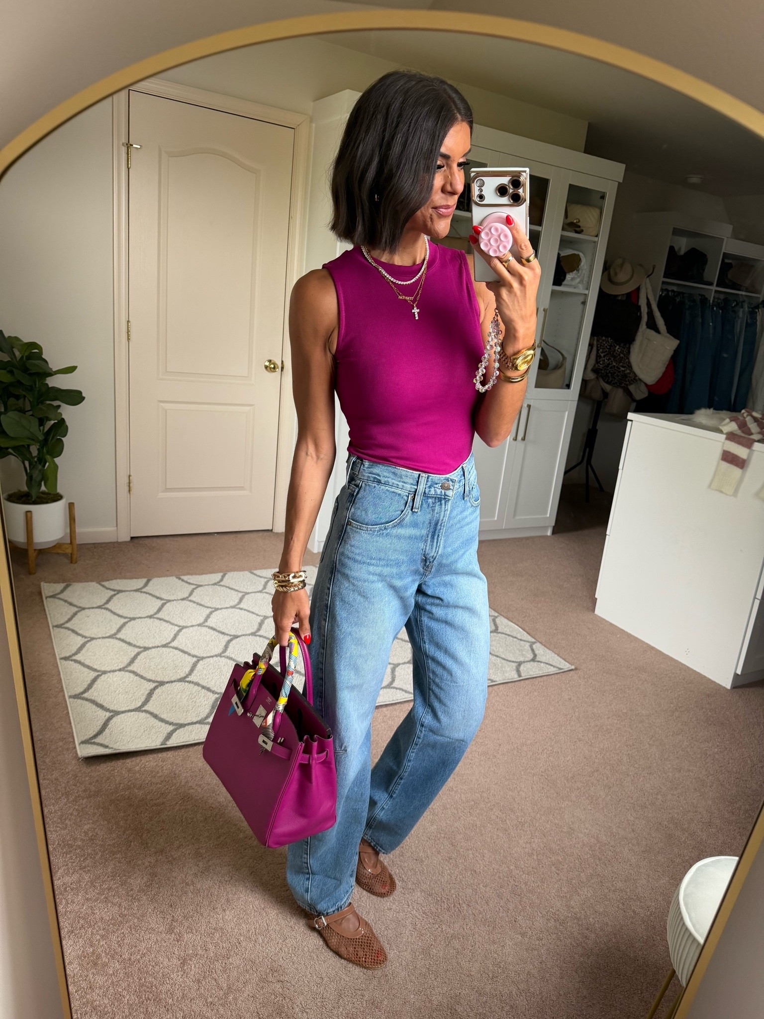 Size small in tank size 25 in Levi jeans