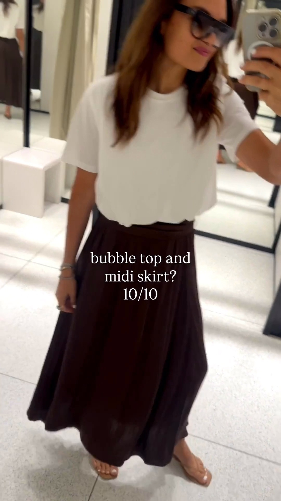 Small bubble top and skirt 
Zara 

Comment SHOP below to receive a DM with the link to this post on my LTK ⬇ https://liketk.it/621WZ