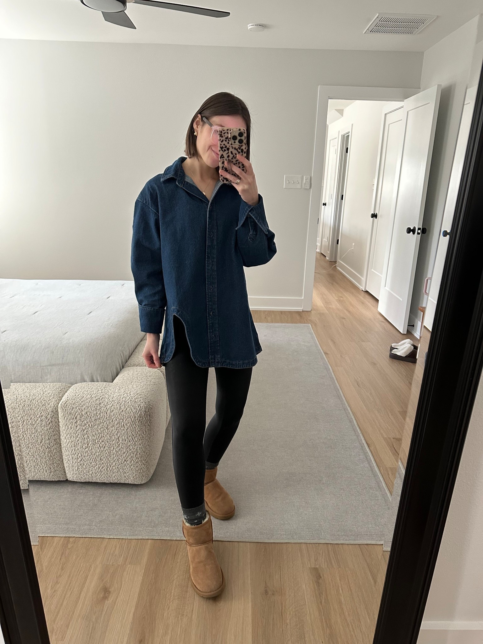 Shopbop Lioness Off Duty dark wash denim shirt with cutout size xs tts - comes in multiple colors 

Spanx faux leather leggings size small tts but I prefer the petite length for less bunching on the ankles. I’m 5’3”

These chocolate brown foldover boots are SO cute and easy to walk in - thinking about grabbing them in black too!

Denim shirt, denim top, structureed denim top, dark denim, dark wash denim, Ugg, Ugg classic mini, Ugg chestnut 

#LTKHoliday #LTKGiftGuide #LTKootd