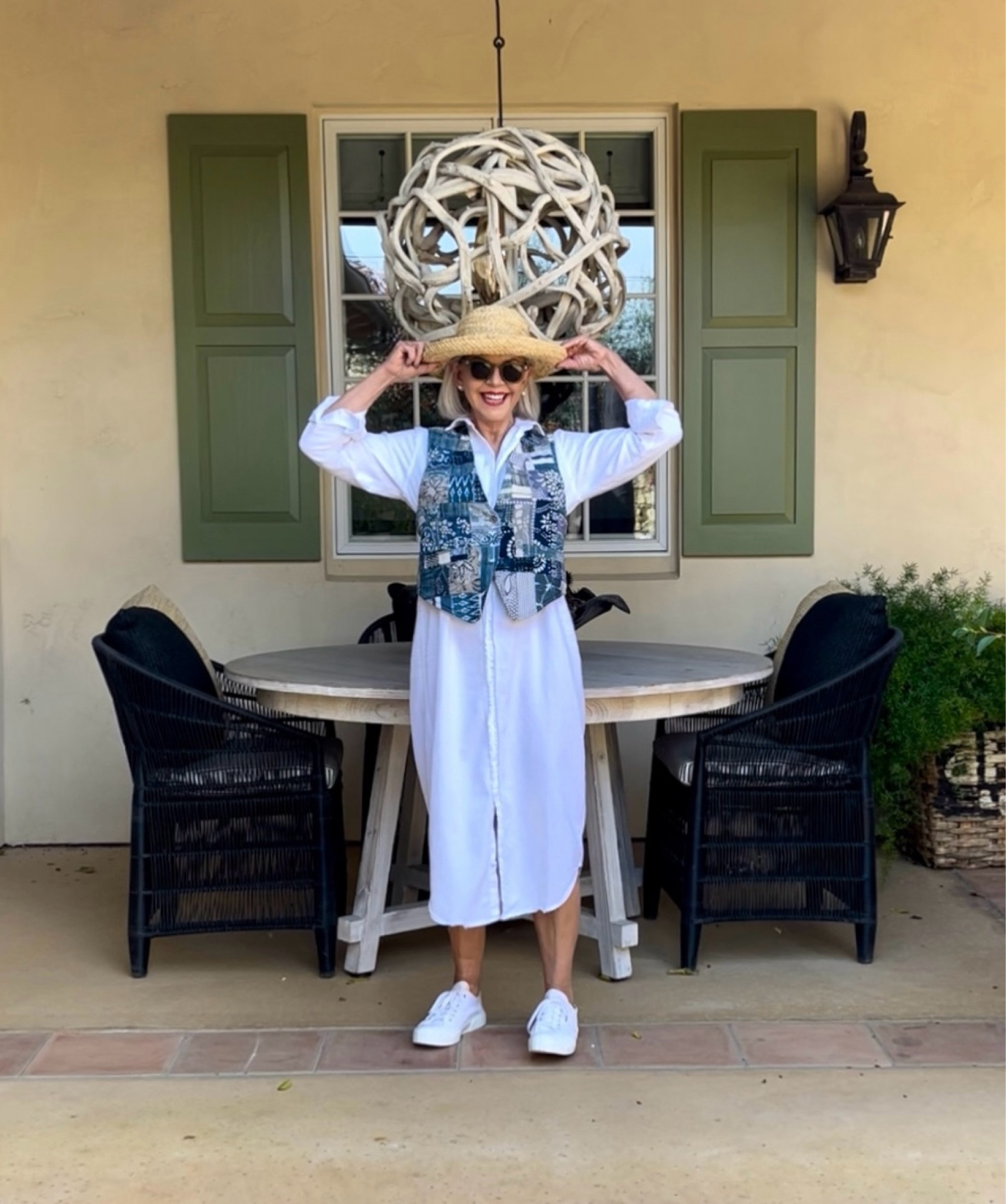 White shirt dress with patchwork vest straw hat and white sneakers

#upcycledvest #strawhat #whitesneakers

#LTKstyletip #LTKover40 #LTKSeasonal