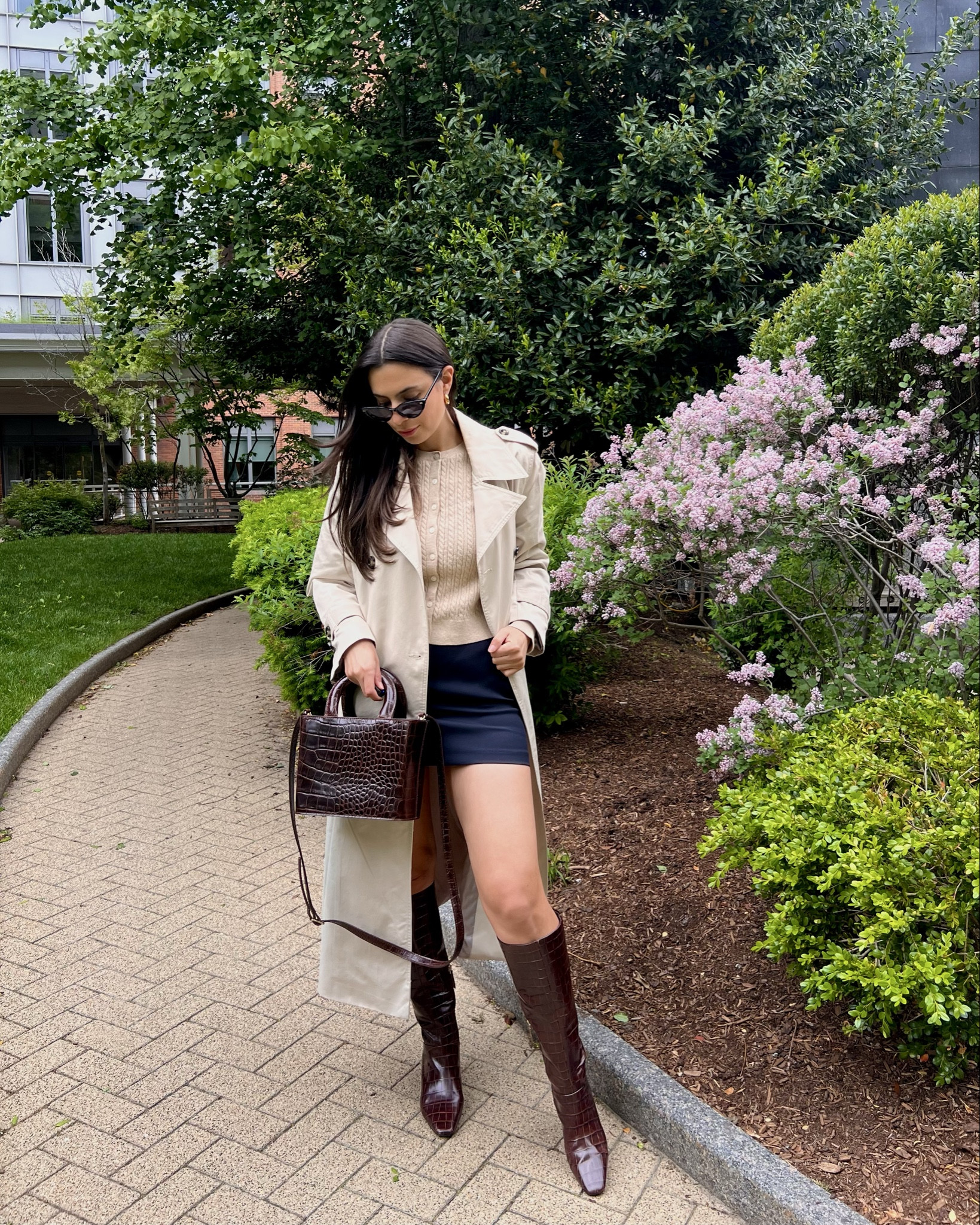 Gloomy day spring style, trench coat style, mini skort, how to style a mini skort, spring outfits, spring ootd, chic spring outfits, rainy day style 

#LTKSaleAlert