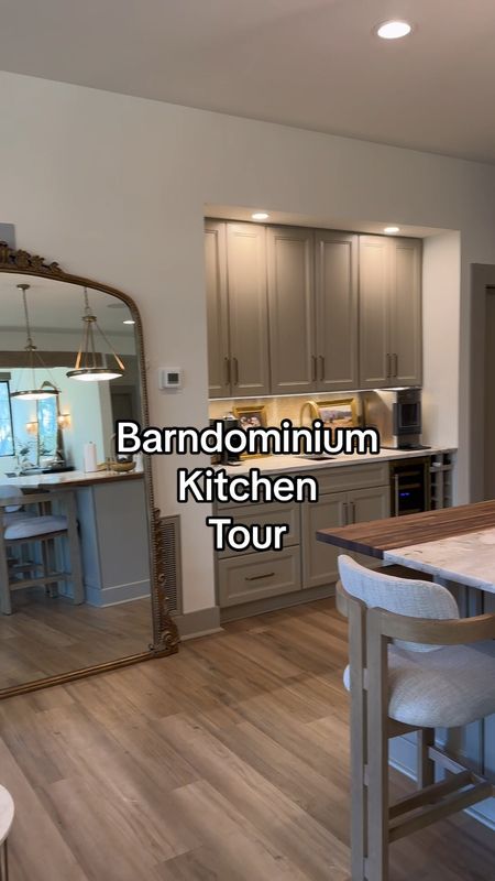 Kitchen tour! Brass appliances big mirror barstools wine fridge kitchen decor home decor butchers block gold frames ice maker wine glasses hardware brass! 🏆
Large mirror 
Faucets 
Wine fridge 
Bar 



#LTKhome #LTKstyletip #LTKfindsunder100