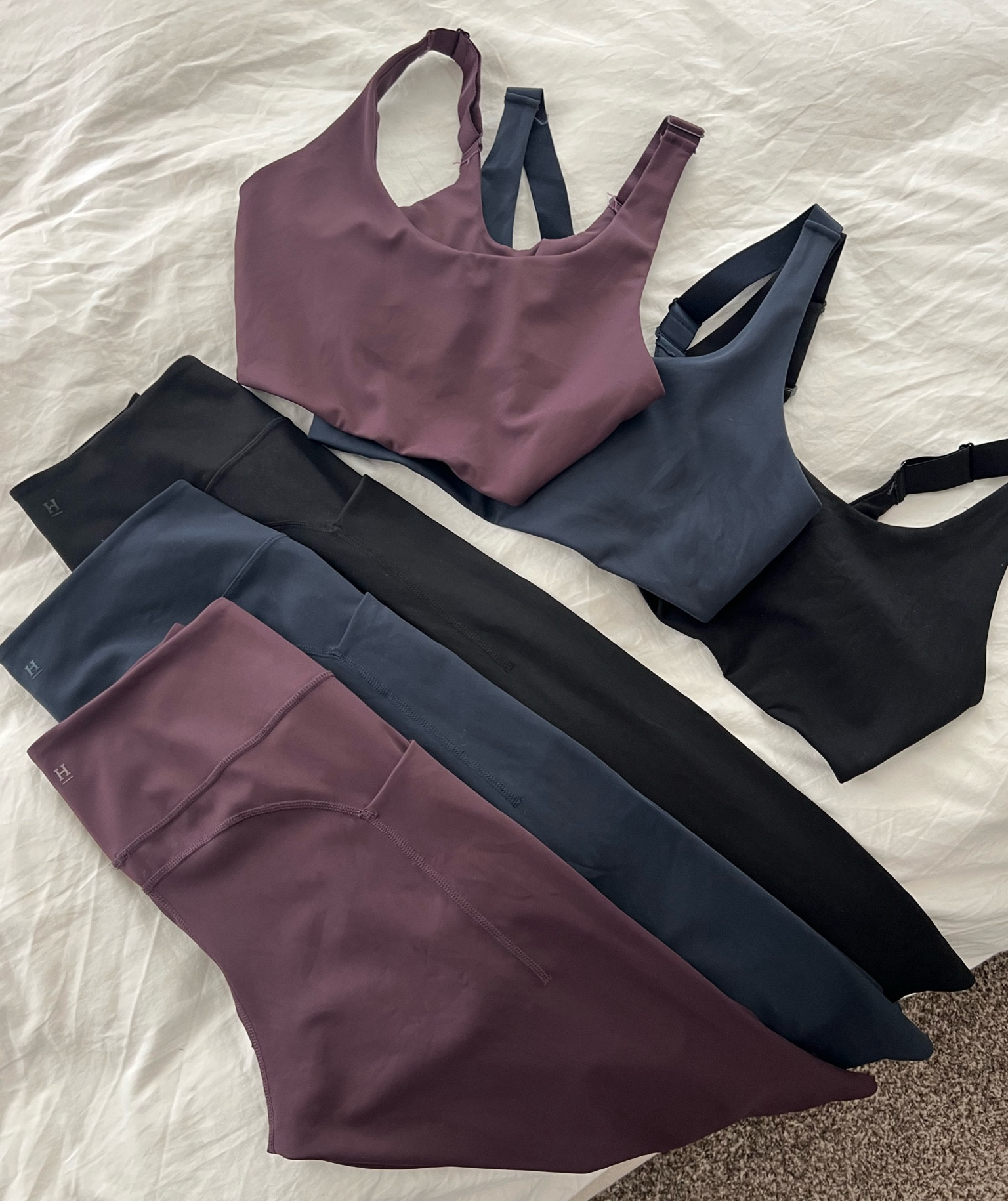 the best workout sets! 

I legitimately have this set in every color they make (including the green, which was dirty so it’s not pictured. lol.) They are the best!! I take a Large in the sports bra & leggings! 

The Warm Up Set will save you the most money & my code stacks on top! Use “GoWildeKellieC” to save! 

#LTKActive #LTKFitness #LTKStyleTip
