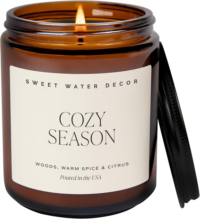 Sweet Water Decor Cozy Season Fall & Winter Candle, 9oz Amber Jar Black Lid | Amazon (US)