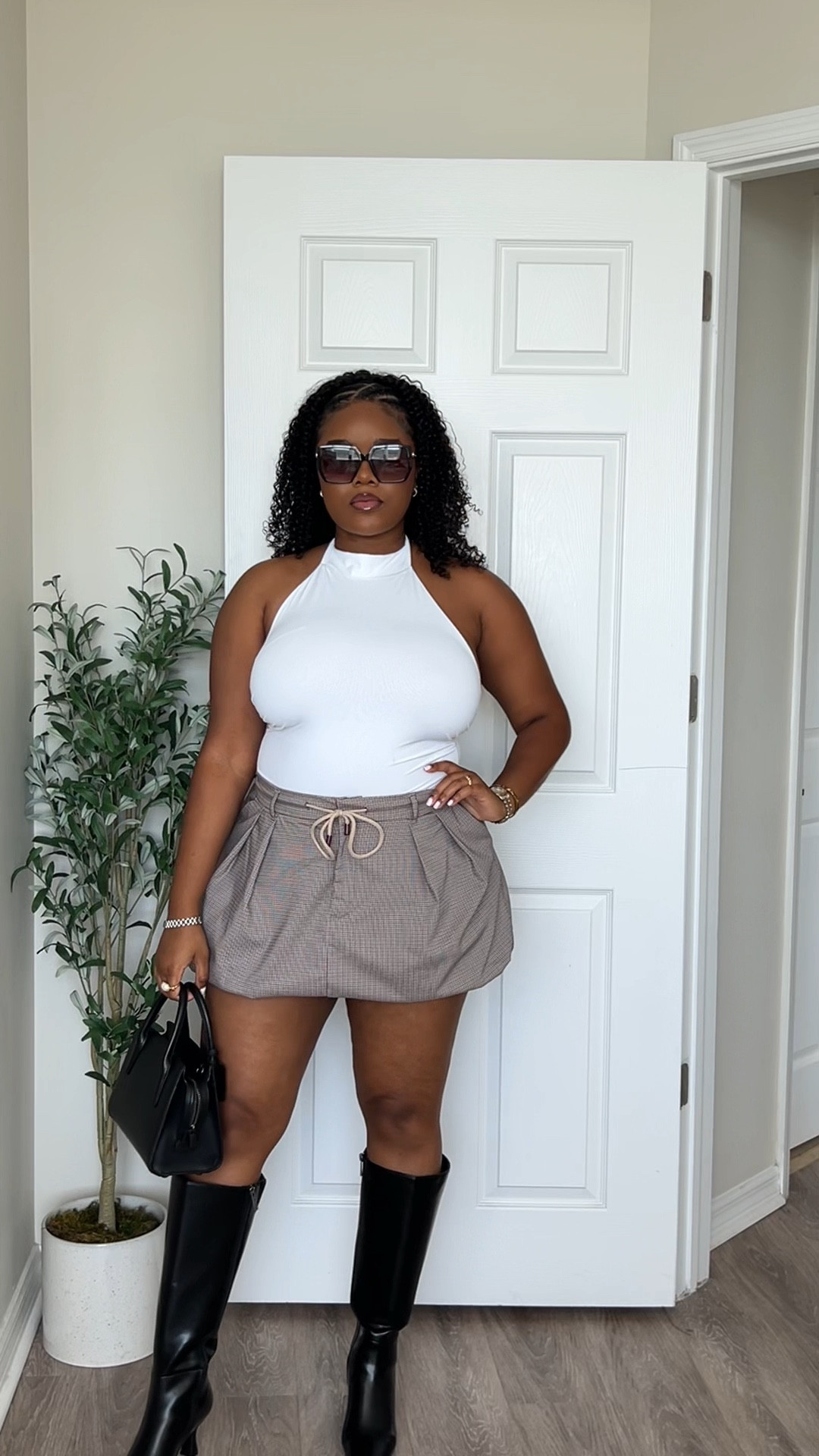 GRWM for Fall fashion for warm and cold days. Perfect fall outfit for girls day or date. White halter body suit, bubble skirt. #fashion #curvyfashion #fallfashion #coachbag

#LTKgrwm #LTKHoliday #LTKMidsize