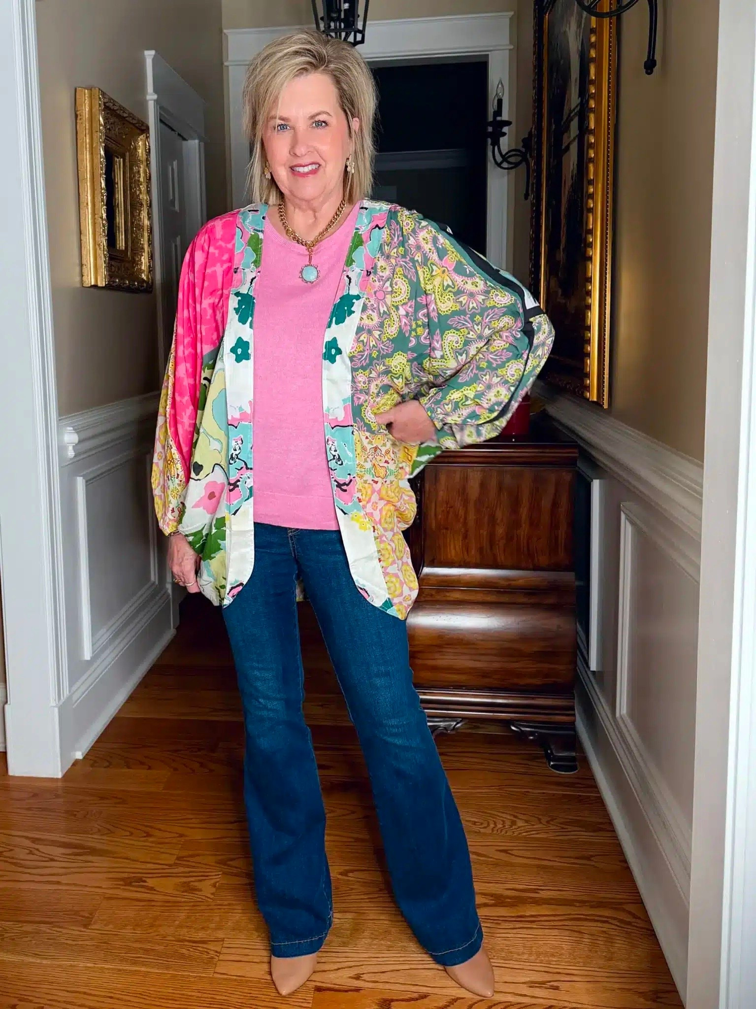 This outfit is bold and colorful! I have on a simple pink sweater, but my ruana gives it something extra. My pull on jeans are a size large from Spanx. They’re the perfect pair to keep from loosening up throughout the day!

#LTKWorkwear #LTKOver40 #LTKootd