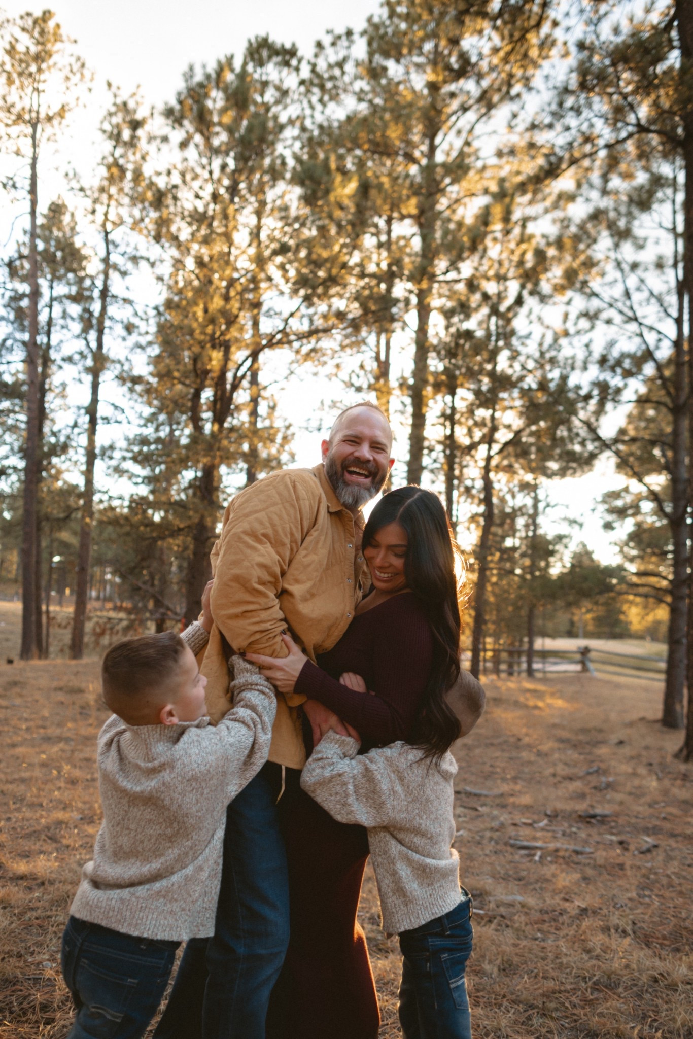 Family photos are always so sweet! Wearing a burgundy sweater dress that would be cute for so many occasions throughout the holidays! The boys are wearing matching quarter zips from Abercrombie.

#LTKmomlife #LTKSeasonal #LTKootd