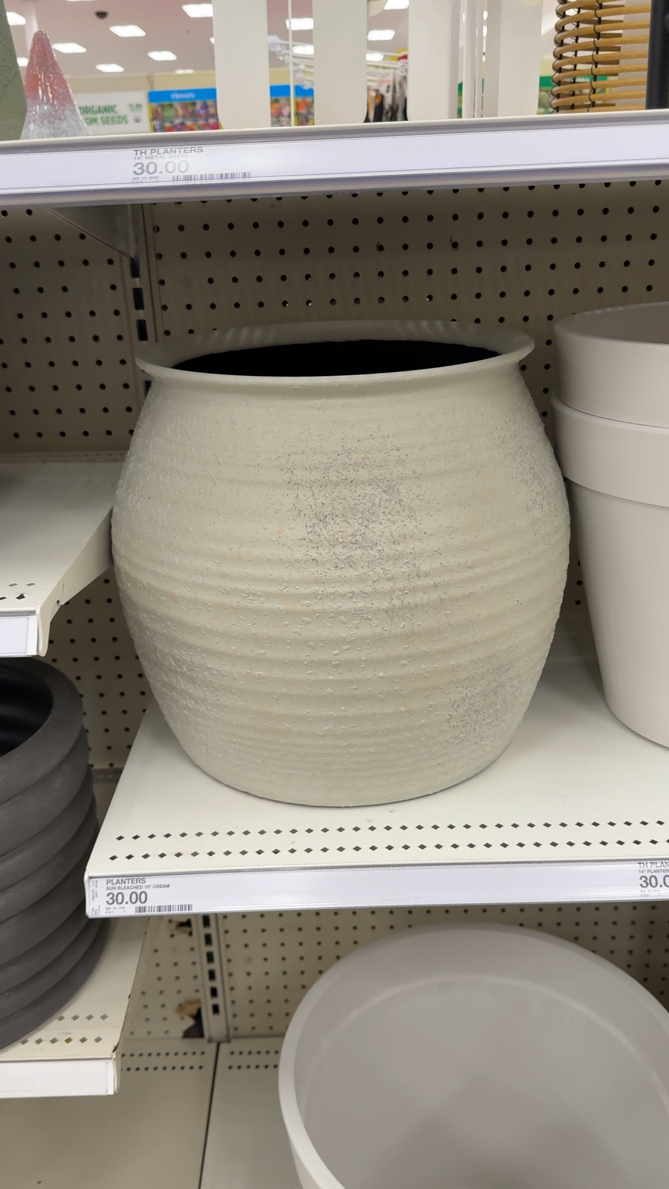 This large planter would be perfect for a faux tree inside your home! Such a nice neutral color and love the texture. 

#LTKFindsUnder50 #LTKSeasonal #LTKHome