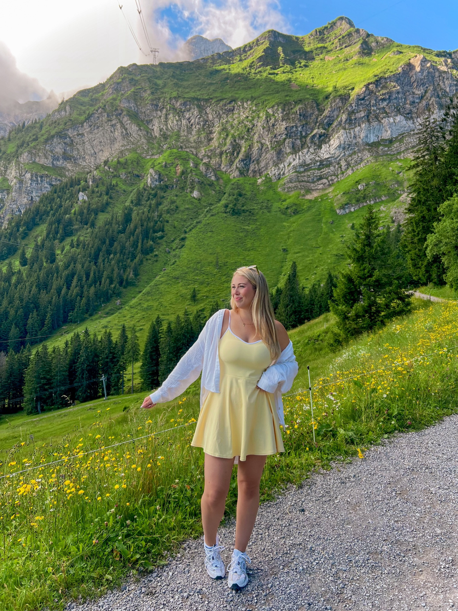 Switzerland hike outfit 💛🌼🐝 #tennisdress #newbalance #yellowdress #summeroutfit #whitebuttondown 

#LTKStyleTip #LTKFitness #LTKTravel