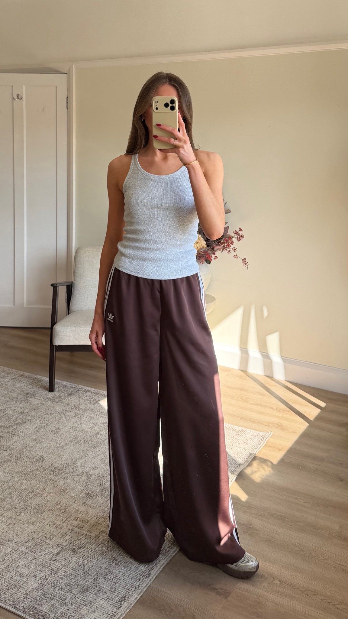 Wearing a 4 in the brown satin trousers, these run really big, size down at least 2 sizes. I’m 5ft 6 
AD. @adidas #createdwithadidas 