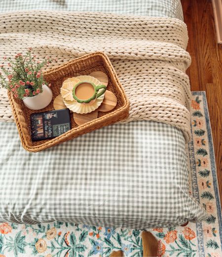 Cozy colorful bedroom with floral rifle paper co rug #riflepaper #bedroom #rug #anthropologie #eclectic #cottagecore