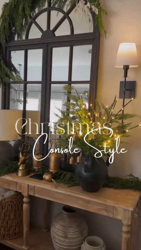 Create a festive entryway with Christmas Norfolk and cedar greenery, gold bells, reindeer and pretty lights . Add a mirror to reflect the decor 

#LTKhome #LTKSeasonal #LTKHoliday