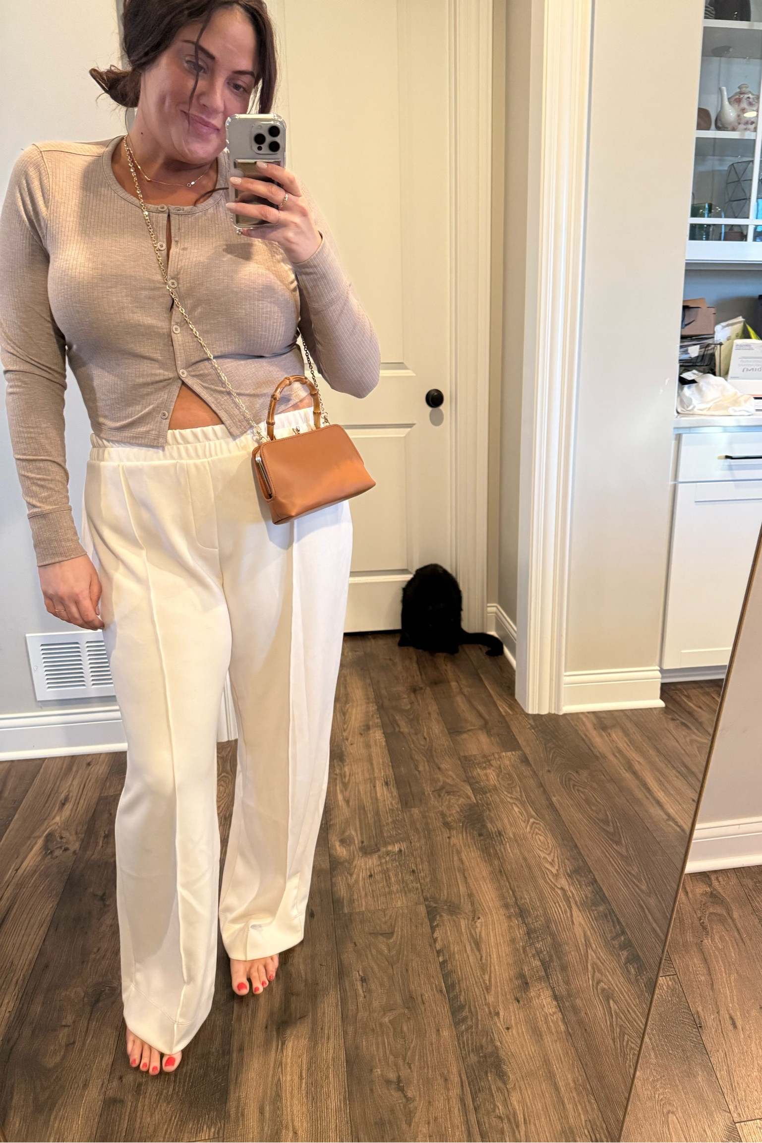 These Target pants are comfortable and can still look elevated. They come in so many different colors, too!  Very similar to Aritizia, but thinner. True to size   

Cardigan is Abercrombie "active" cardigan - whatever that means. I did size down just so I could make it look contrasting with the pants. That's what's great about any button up- you can change the whole look just by unbuttoning a few buttons at top or bottom  

#LTKWorkwear #LTKMidsize #LTKFindsUnder100