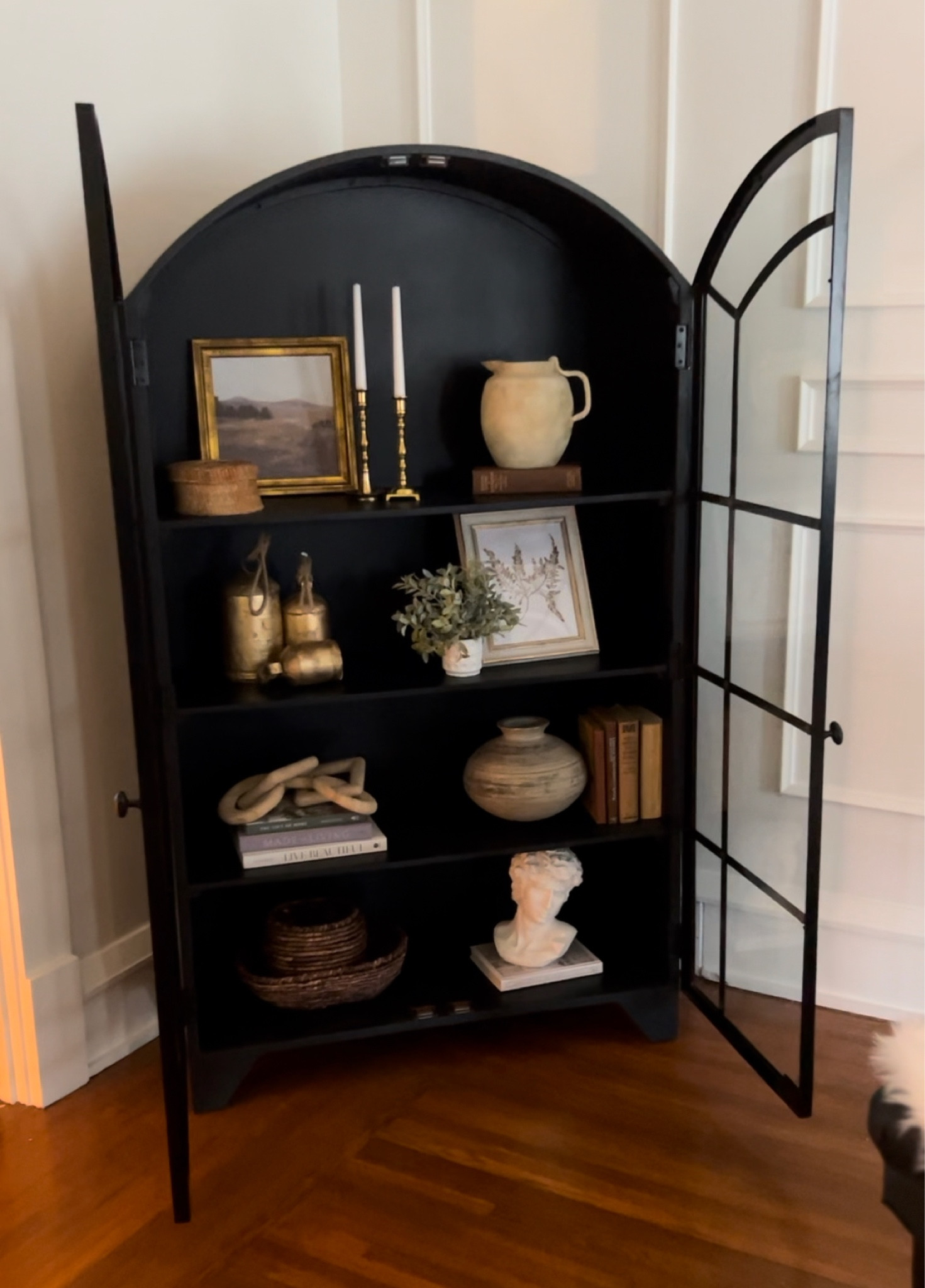 Shop my cabinet, home decor, David bust, coffee table book, coffee table, Loloi rug, framed art, light up branches, Pottery Barn vase and chandelier.

#LTKunder50 #LTKhome #LTKstyletip