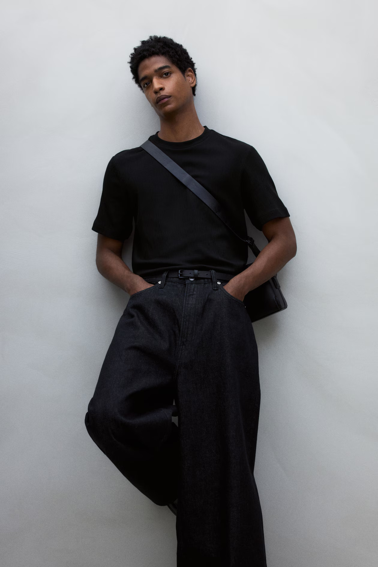 T-Shirt mit Struktur in Regular Fit - Schwarz - Men | H&M DE | H&M (DE, AT, CH, NL, FI)