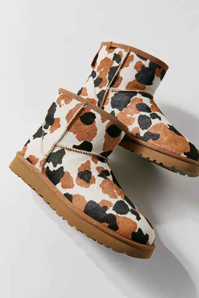 UGG Classic Mini Cow Print Calf Hair Boot | Urban Outfitters (US and RoW)