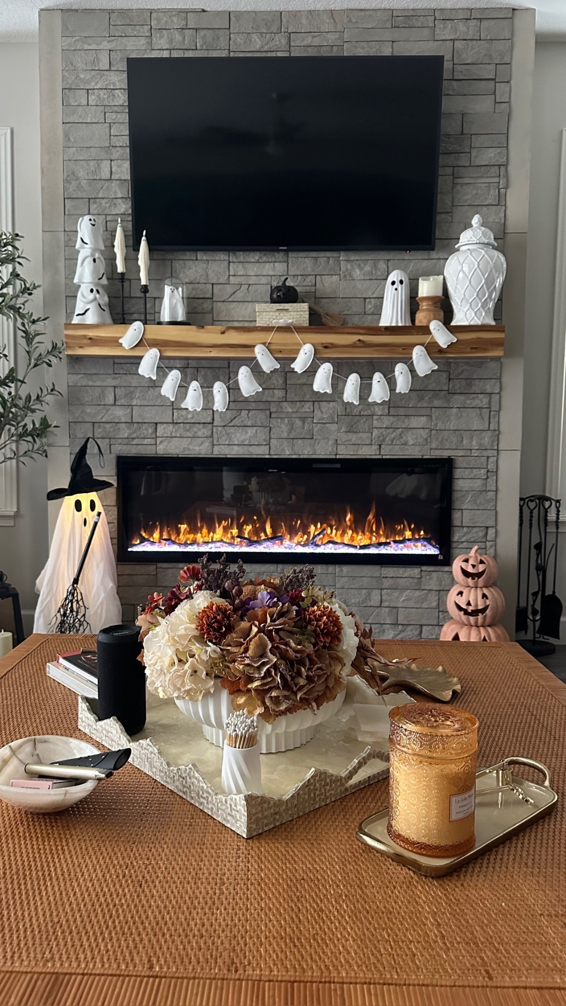 Halloween ghost decor ideas for mantel and fireplace. Cozy vibes #falldecor .#ghostdecor .#mantel #ghost #ghostcsndles #ghostgarland .#halloweendecor #cozyfallhome 

#LTKSeasonal #LTKHalloween #LTKHome