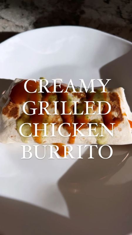 Protein Packed Creamy Chicken Burrito 

Ingredients:
4 chicken breasts- cut into inch cubes 
1 can green enchilada sauce 
1 packet taco seasoning
2 tsp chipotle cholula sauce 
1 4oz can diced green Chiles 
1 cup shredded Colby Jack cheese 
1 cup cottage cheese
Taco Bell mild sauce &
Verde salsa for topping 
Tortillas 

Recipe:
In your instant pot add your can of enchilada sauce, diced chicken and half the packet of taco seasoning- mix well and cover with lid and use the pressure cook setting for 8 minutes. (You can also do this in a crockpot on high for 3 hours or low for 6 hours) 
While your chicken is cooking- add your cottage cheese, remaining taco seasoning, diced green Chiles and chipotle cholula into a blender or food processor, mix well. 
When your chicken is done cooking, remove it from the enchilada sauce and put it in a clean bowl, add in half of your cottage cheese mixture as well as your shredded cheese and mix it well. You will end up with a creamy & delicious protein packed filling for your tortilla. Fill your tortilla and roll it, grill/pan sear it on both sides to give it a nice crunch and then top with verde salsa and Taco Bell sauce. Enjoy! 
*these are great to make ahead and freeze as well* and the cottage cheese sauce can be used on anything, makes a great dip too 🤤

#LTKVideo #LTKFindsUnder50 #LTKFamily