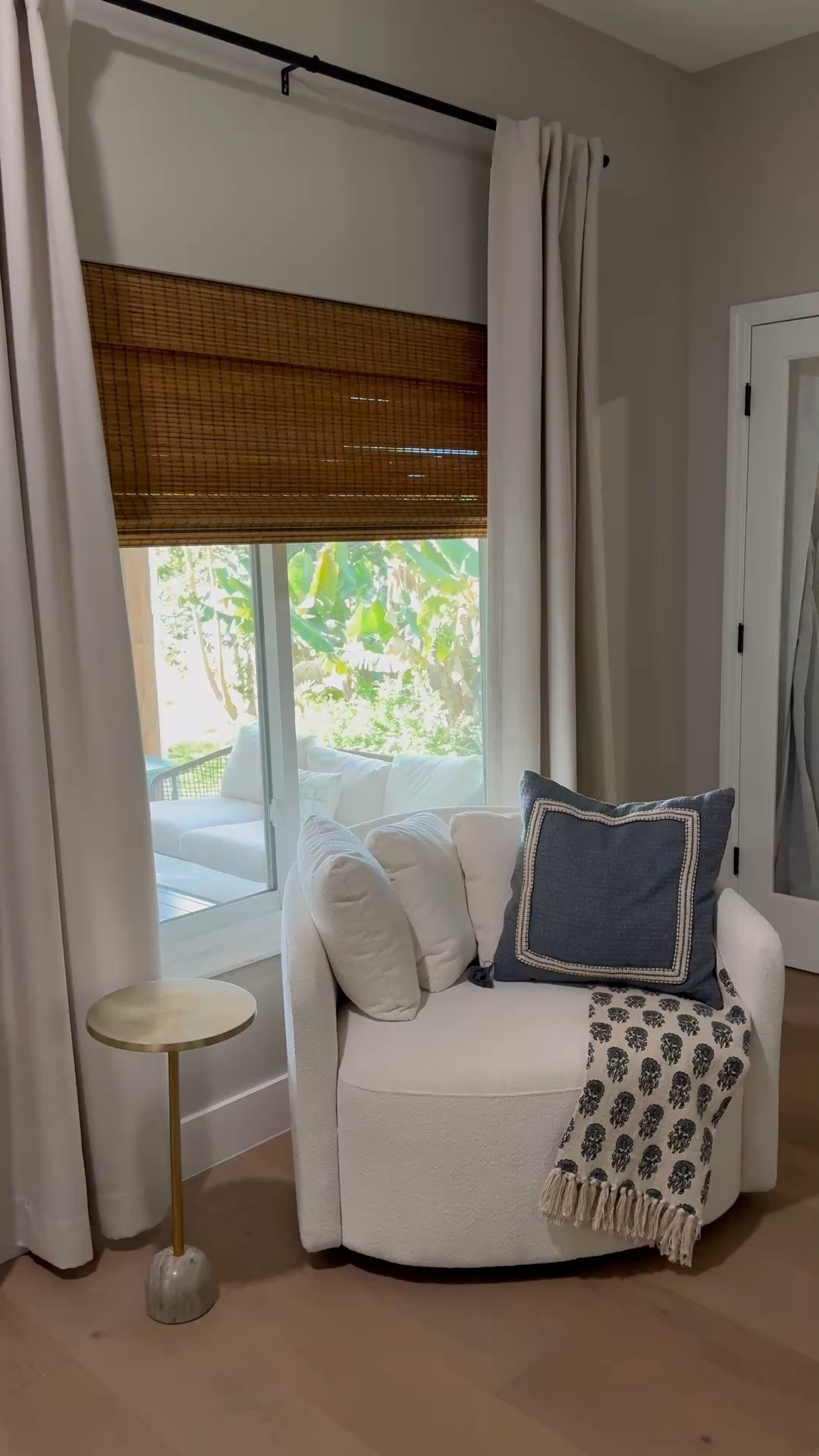 My favorite round swivel chair!  Home decor, living room decor, cozy sitting corner, bamboo blinds, curtains, window treatment 

#LTKHome #LTKSeasonal #LTKdayinmylife