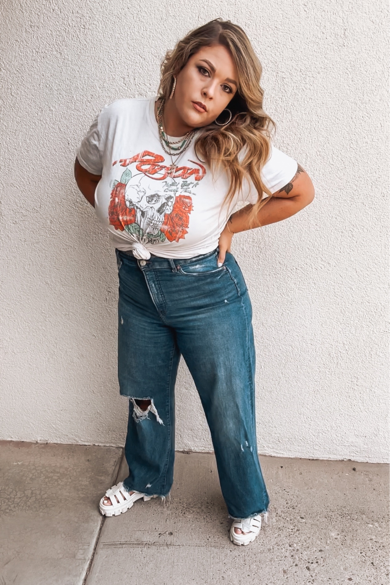 Tied up band tees and big jeans 

#LTKcurves