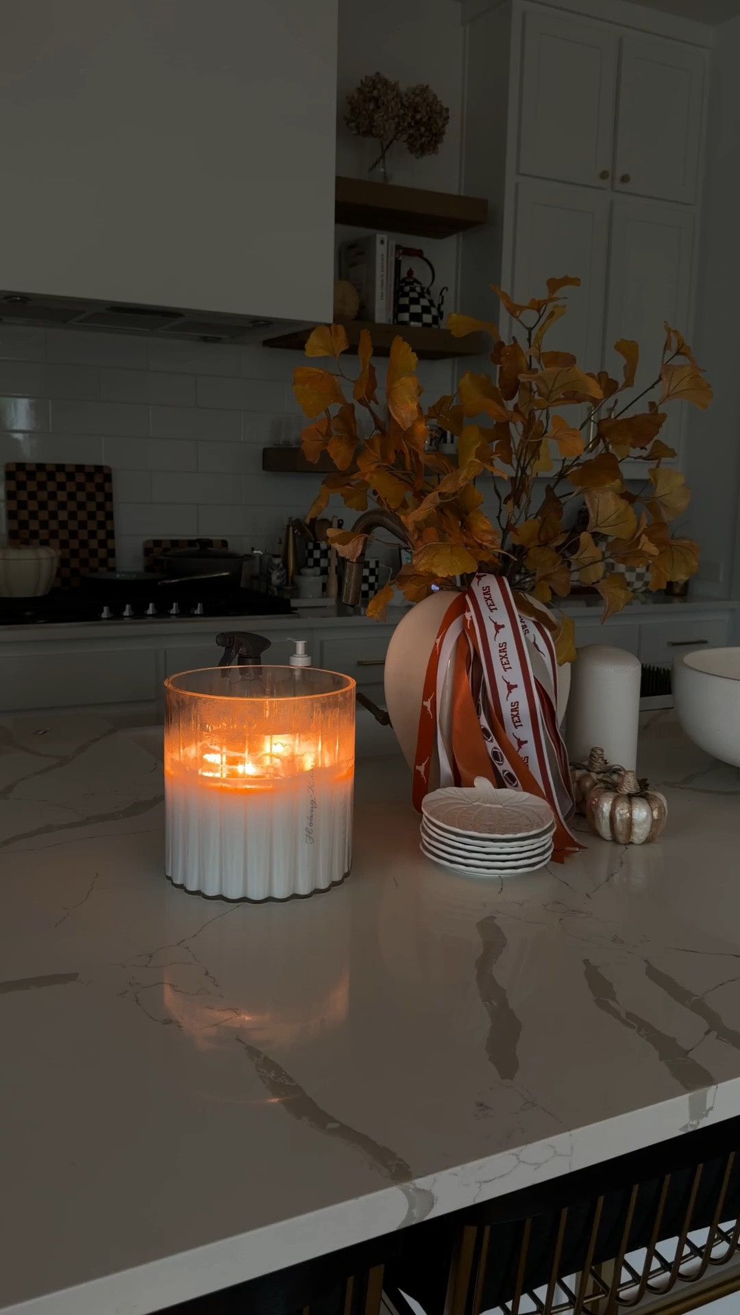 Fall kitchen decor that’s practical! A modern vase, fall stems from Target, pumpkin plates, mini MacKenzie-Childs pumpkins and, of course, baby wipes in a cute container so it lives on the island all the time!

#LTKmomlife #LTKHome