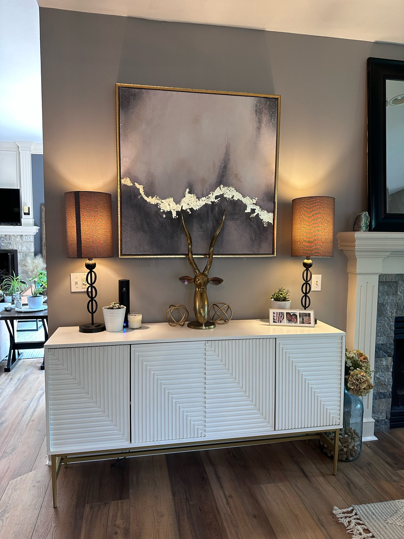 Loving this white minimalist / Scandinavian style sideboard buffet table (gold accents). Looks so good in my hearth room 🤍 We also LOVE our hotel diffuser - it’s our trick to always keeping our house smelling amazing, and is ALWAYS noticed by guests! 100% worth the money!

#LTKhome #LTKsalealert #LTKstyletip