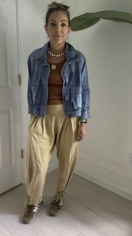 These Free People sweatpants come in several color and I love them. So comfy. This crochet jacket is from Garage Clothing last year but I linked similar ones. The tank top is the perfect length for high waisted pants and comes in different colors. Also love the seashell choker (I’m wearing XS pants and S tank top) could be a festival outfit, vacation outfit, travel outfit | Jean jacket 

#LTKtravel #LTKover40 #LTKVideo
