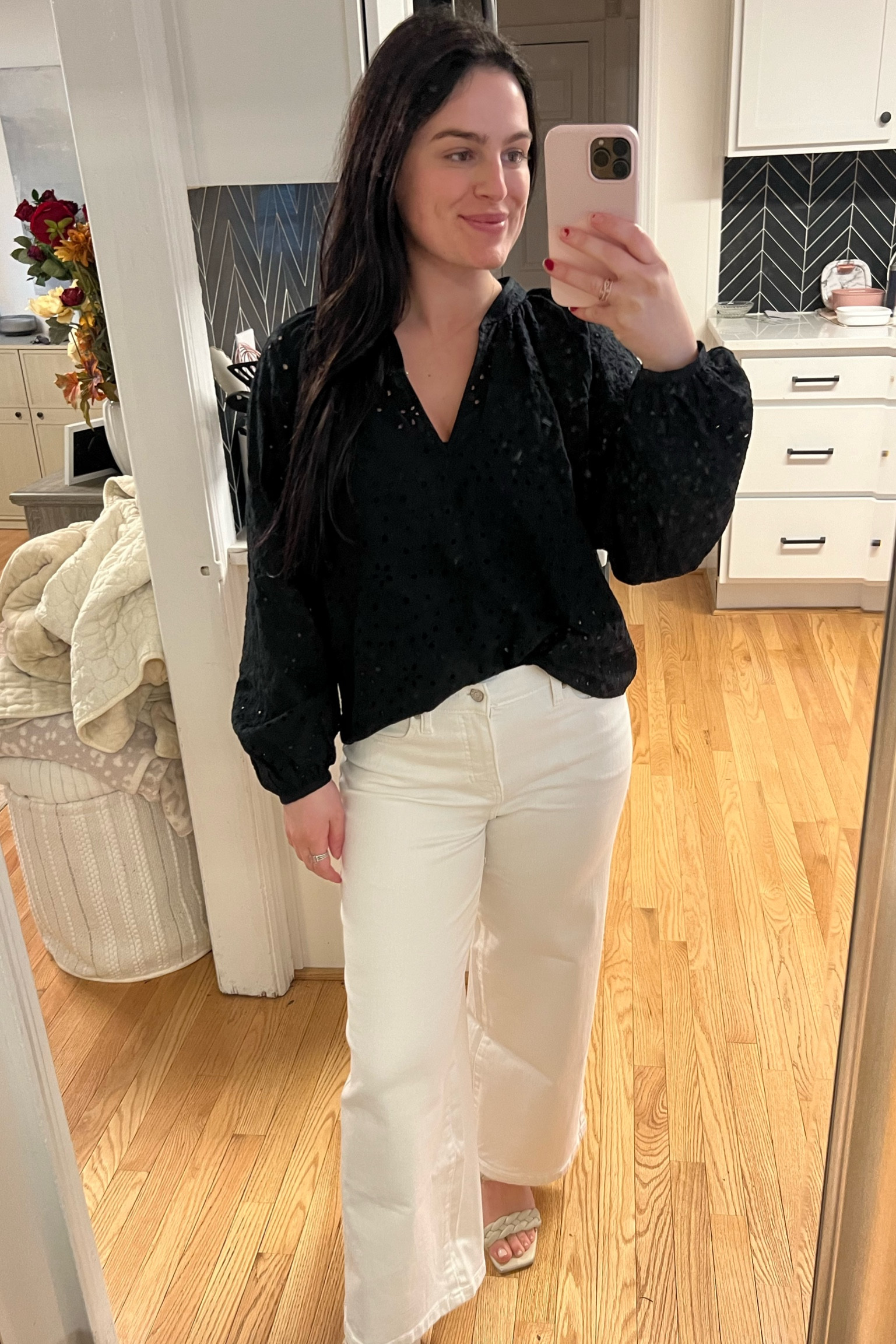 Black blouse with eyelet embroidery and white high rise wide leg jeans paired with white block heeled sandals perfect for the office in the spring or church!

#LTKworkwear #LTKSeasonal #LTKSpringSale