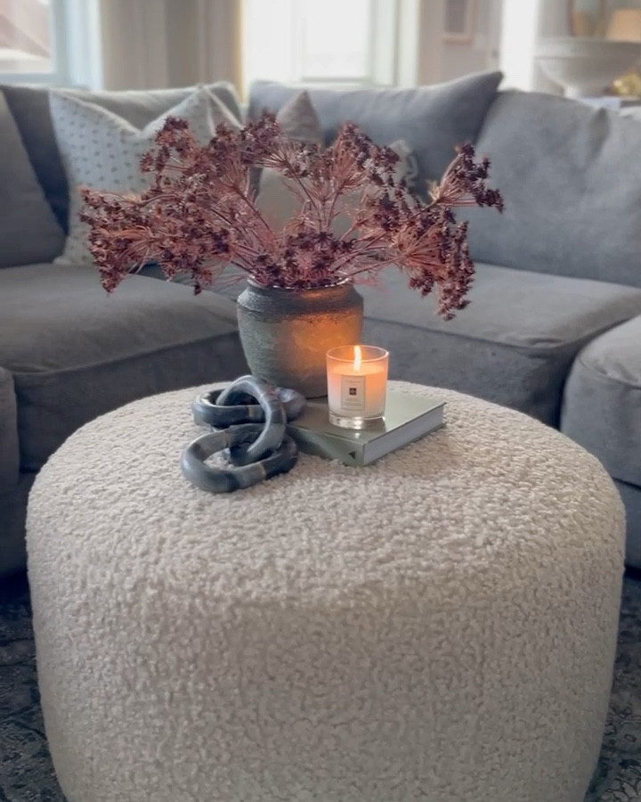 One thing I love about our basement is our large media space! The coziest sectional to watch movies as a family. I love using softer elements in spaces like this. For example, this cozy teddy ottoman serves perfectly as a coffee table and also landing place for feet! 

#LTKStyleTip #LTKHome