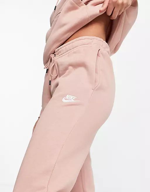 Nike Essential Fleece slim joggers in rose whisper | ASOS (Global)