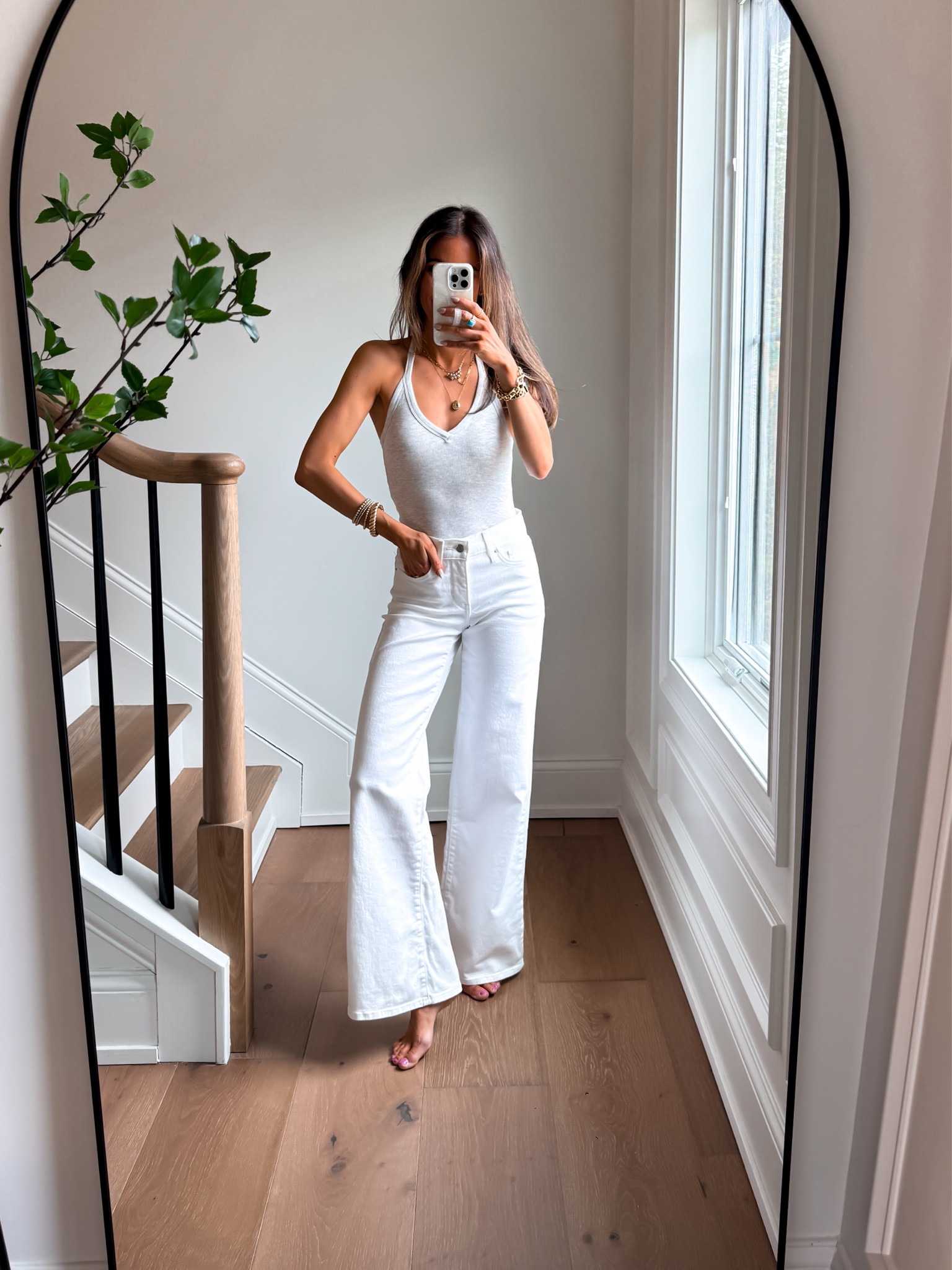 Tank has a built in bra. I’m wearing a xsmall. These stretchy shaping widely jeans have a built-in tummy slimming panel and make your backside looks so good. Fit true to size. 

#LTKootd #LTKmomlife #LTKgrwm